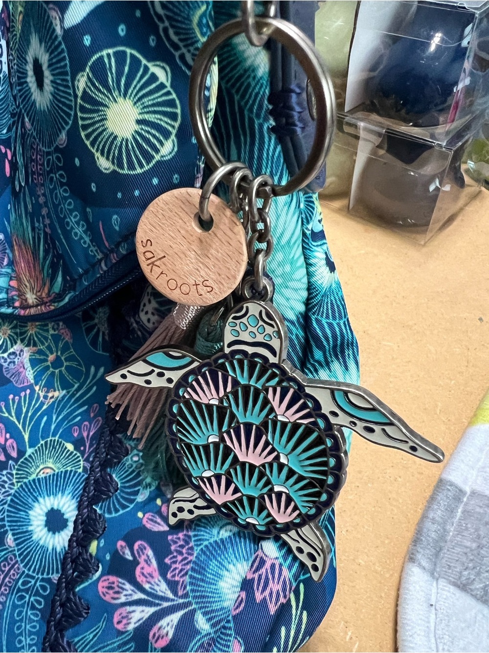 Sakroots Sea Turtle Crossbody Bag with Sea Turtle Charm - Picture 9 of 9
